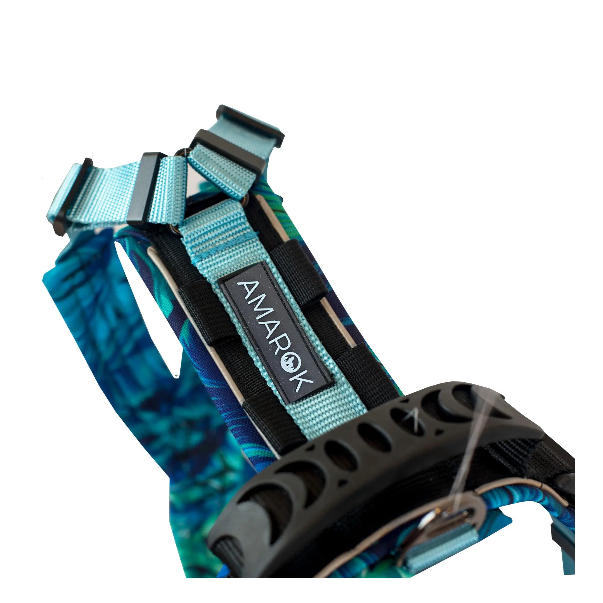 Close-up of the Amarok Odyssey harness – reinforced back handle, and visible backpack attachment points